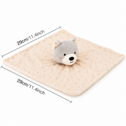 A square beige baby comforter with a gray plush bear head on top, shown on a white background with dimension lines indicating 29cm by 29cm (11.4 inches) on each side.
