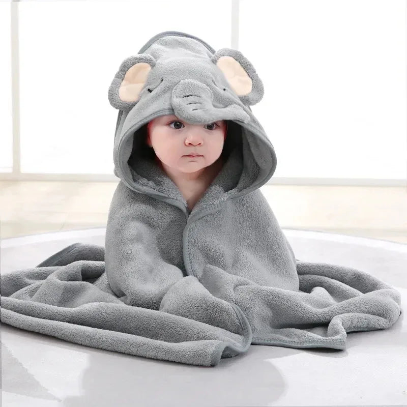 A collection of soft hooded baby towels in blue, gray, white, and pink colors, each with a cute animal face pattern.
