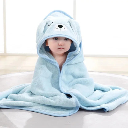 A collection of soft hooded baby towels in blue, gray, white, and pink colors, each with a cute animal face pattern.