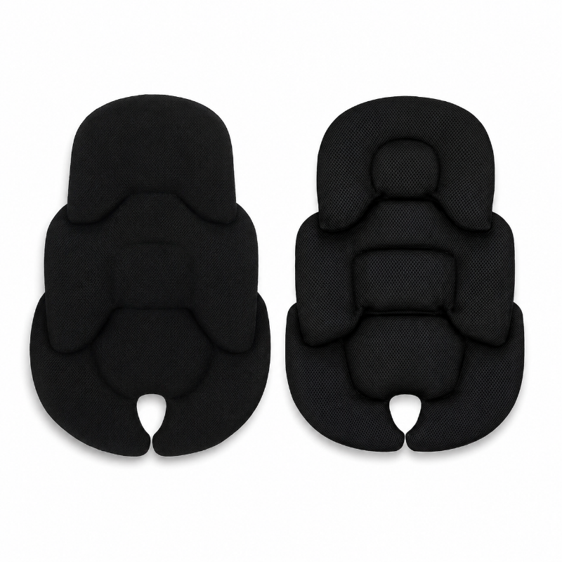 Two black textured baby support pads shown from front and back views on a plain white background.