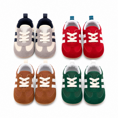 Six pairs of toddler lace-up shoes arranged in a 2x3 grid on a white background, including gray and navy, red and white, brown and white, and green and white colorways.