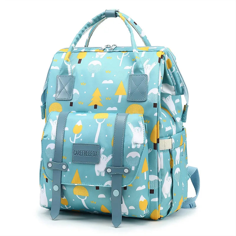A gray waterproof nappy backpack with multiple compartments and shoulder straps, displayed against a white background.