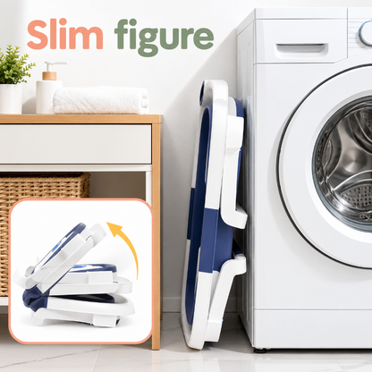 A slim white and navy folding body slimming device shown leaning against a white washing machine in a bright laundry room, with the text 'Slim figure' at the top and a small inset demonstrating the device folded.
