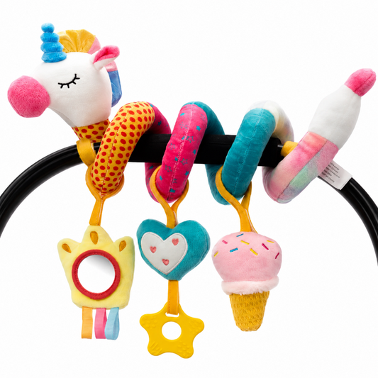 A colorful baby sensory chew toy set featuring a plush unicorn head, patterned ring, teal ring, pink-and-white ring, and an ice cream cone charm hanging from a black circular bar on a white background.