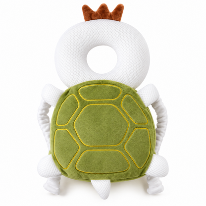 A plush turtle baby teether or toy with a white textured body, green stitched shell, and small brown horn accents on top, shown on a plain white background.