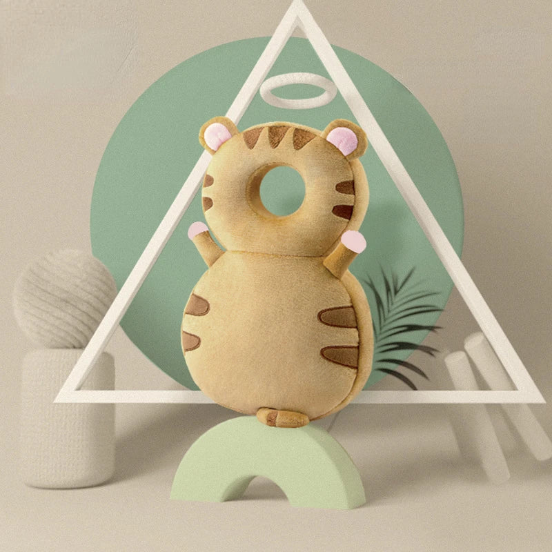 A collection of colorful baby head and back protection pillows with various animal designs displayed against a pastel background.
