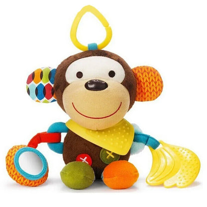 A colorful plush baby toy in the shape of a lion with various textures and a teething ring attached.