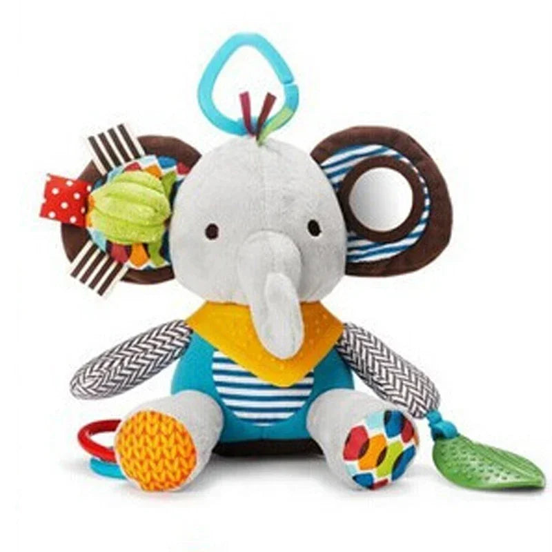 A colorful plush baby toy in the shape of a lion with various textures and a teething ring attached.