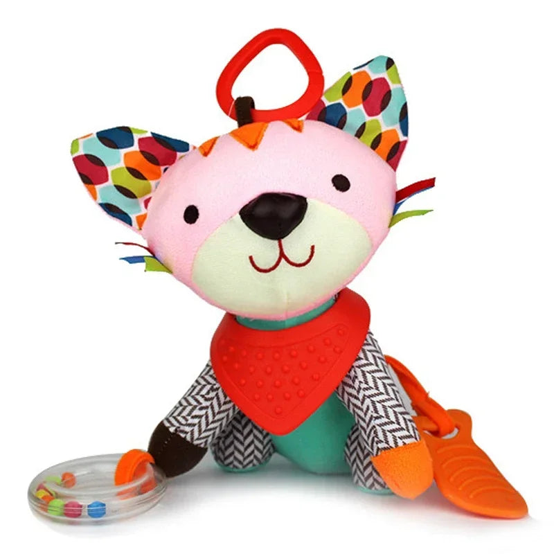 A colorful plush baby toy in the shape of a lion with various textures and a teething ring attached.
