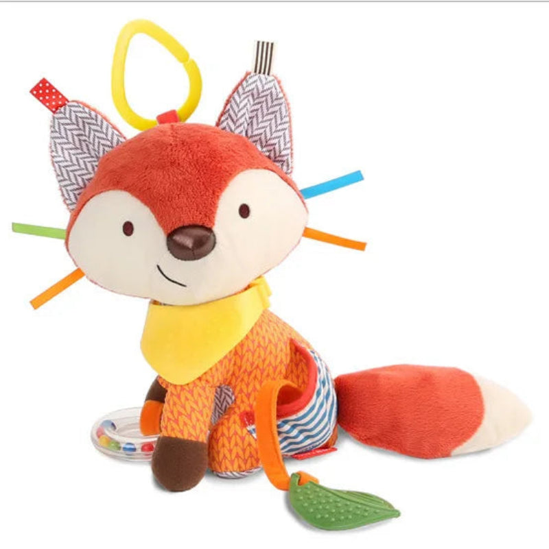 A colorful plush baby toy in the shape of a lion with various textures and a teething ring attached.